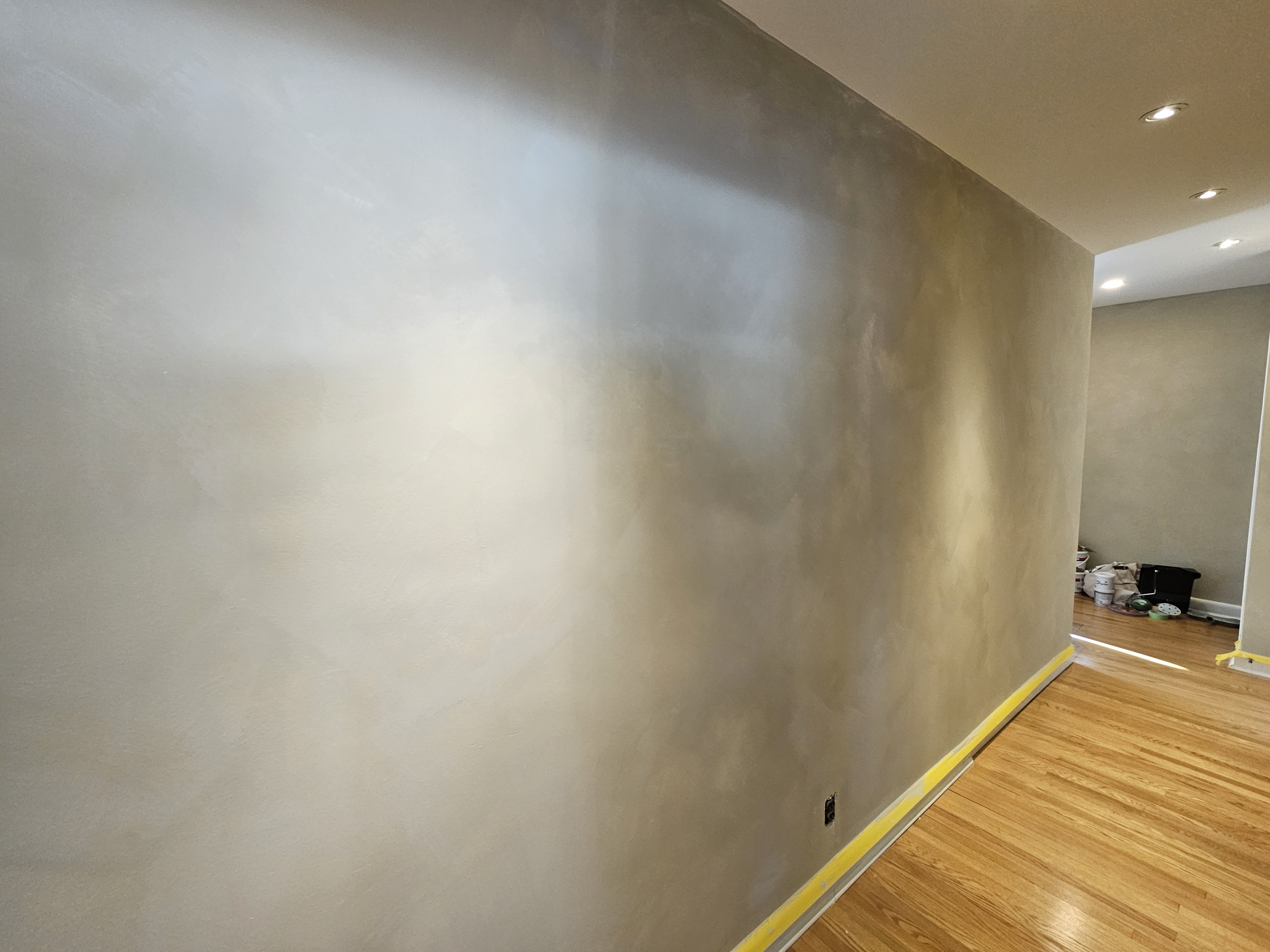 Burnished lime plaster wall in a pale champagne tone
