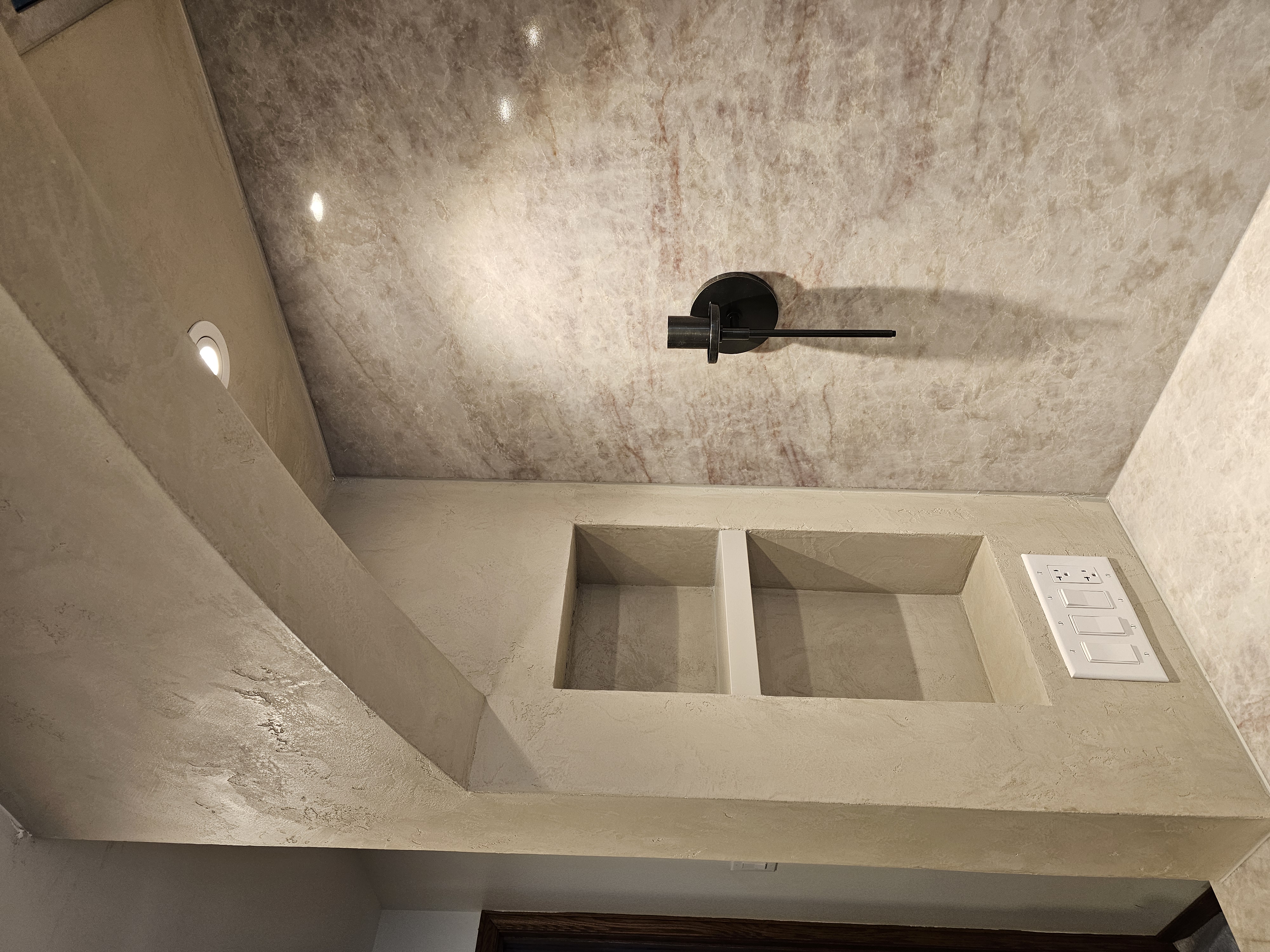 Arched plaster niche with shelving