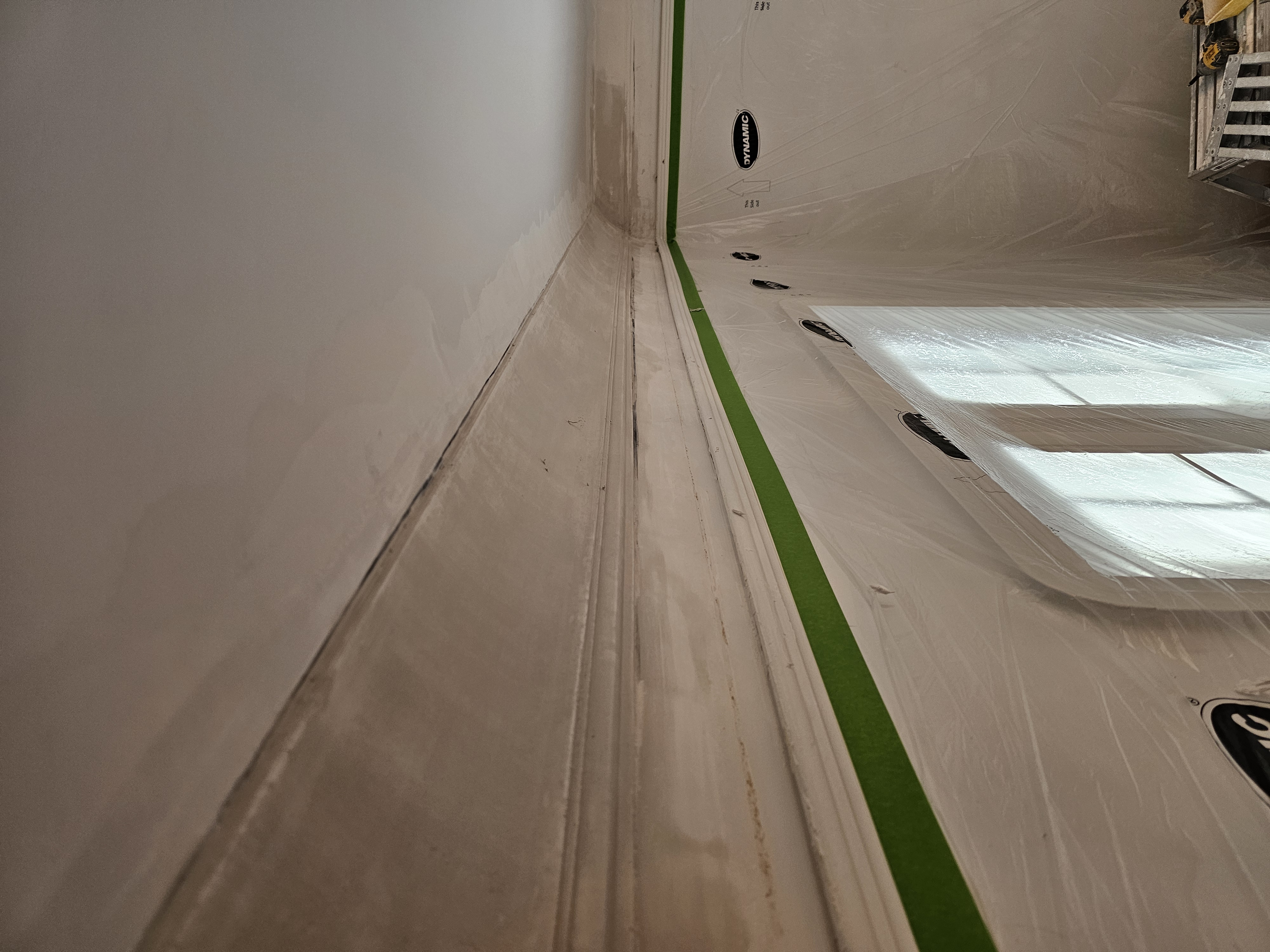 Wall and ceiling junction, finished plaster